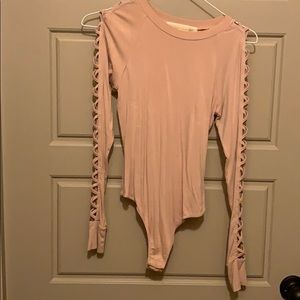 Peach body suit